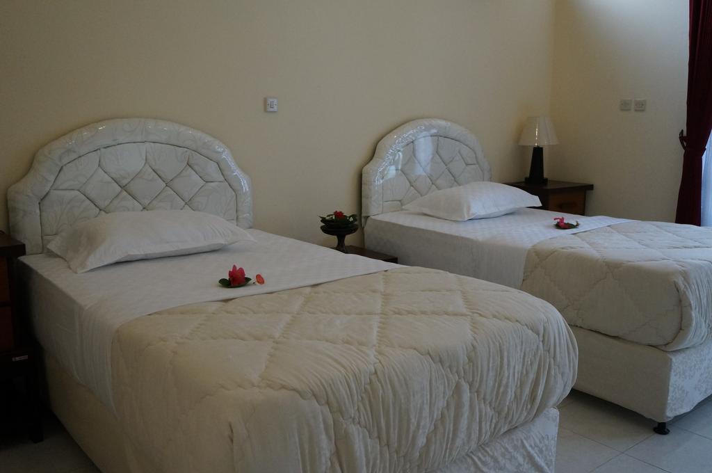Hotel Angsoka Temukus Oda fotoğraf
